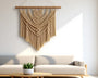 Macramé mural moderne : tendances géométriques et minimalistes 2026