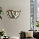 Décoration murale bohème macramé fils drapés barre courbée | Drapa Décorations macramé