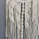 Attrape-rêve macramé — détail nœuds tressés et perle bois