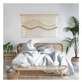 Décoration murale bohème macramé vagues — chambre bohème, lit rattan, palmier d'intérieur