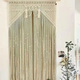 Rideau macramé coton Kheïma dans salon avec porte et plante verte