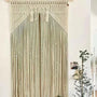 Rideau macramé coton Kheïma dans salon avec porte et plante verte