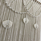 Détail plumes coton et nœuds centraux rideau macramé Zéphyr