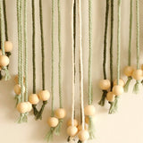 Extrémités perles bois coloris vert suspension macramé Maya
