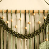 Détail tresse et nœud coloris vert suspension macramé Maya