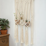 Tapisserie murale macramé suspensions plantes — détail nœuds tressés